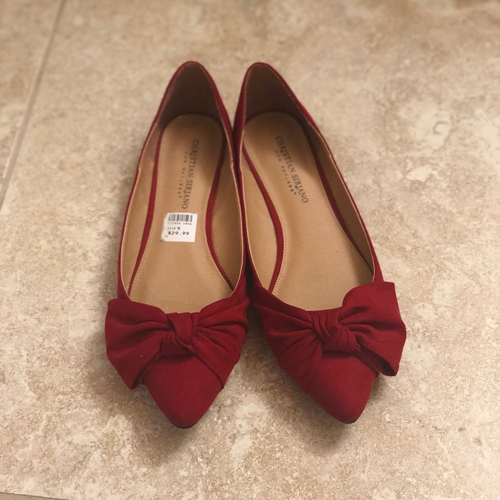 Red pointy toe flats with bow
